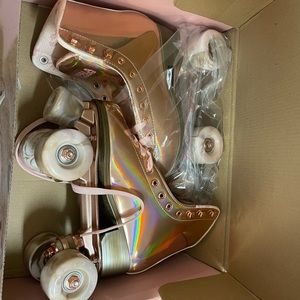 Pink holographic impala skates